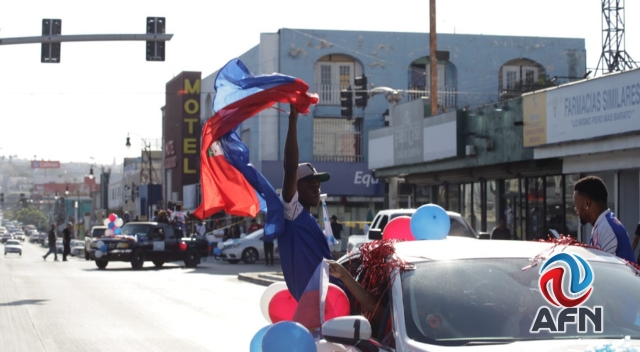 Haitianos realizan caravana en Tijuana previo al partido de su selección en el Mundial