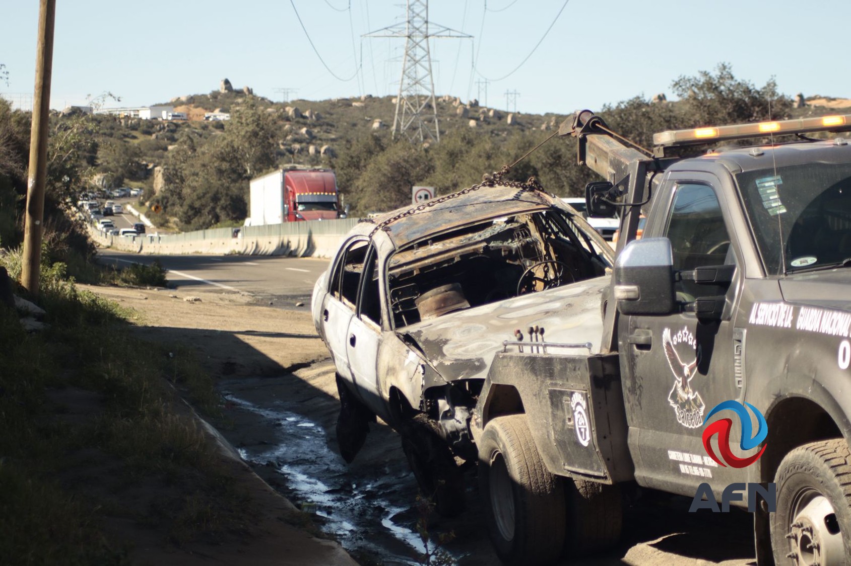 Incendian vehículos en carreteras de BC tras muerte de El Mencho